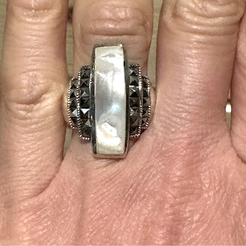 Mother of Pearl Marcasite sterling silver ring. Approx size 6